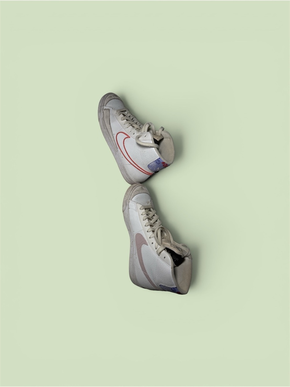 Nike White High-Top Sneakers with Pink Swoosh Accent